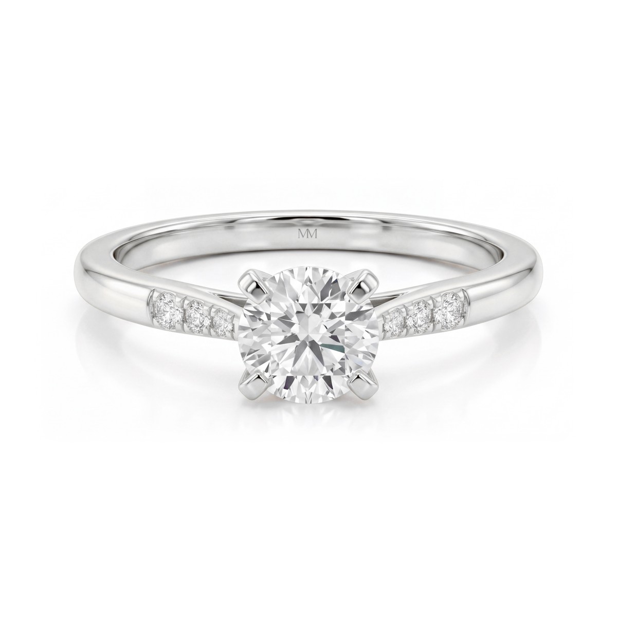 Melodie - Ring med rund moissanite og graduerede sidesten