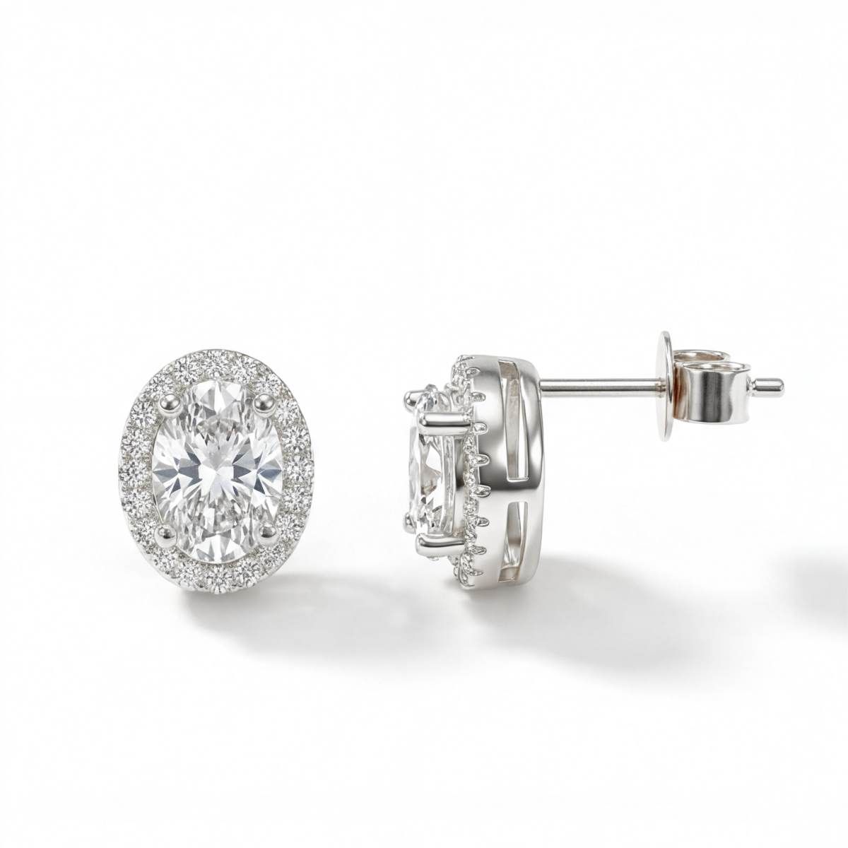 Ellipse - Ovale ørestikker med moissanite i halofatning